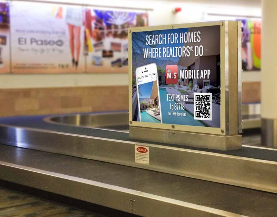 Palm Springs Airport sign at luggage pick up terminal showing ad