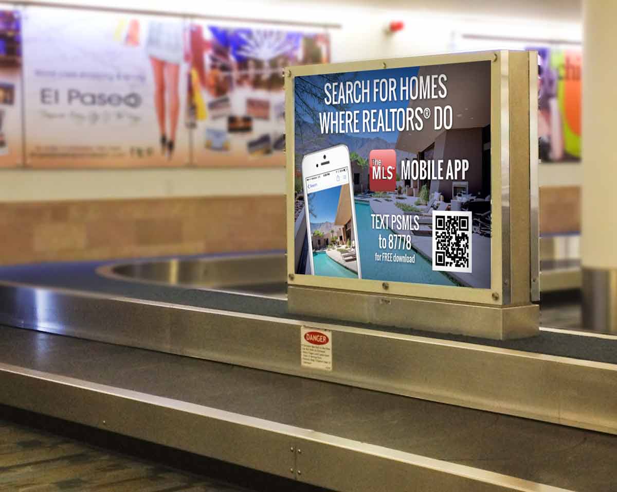 Palm Springs Airport sign at luggage pick up terminal showing ad
